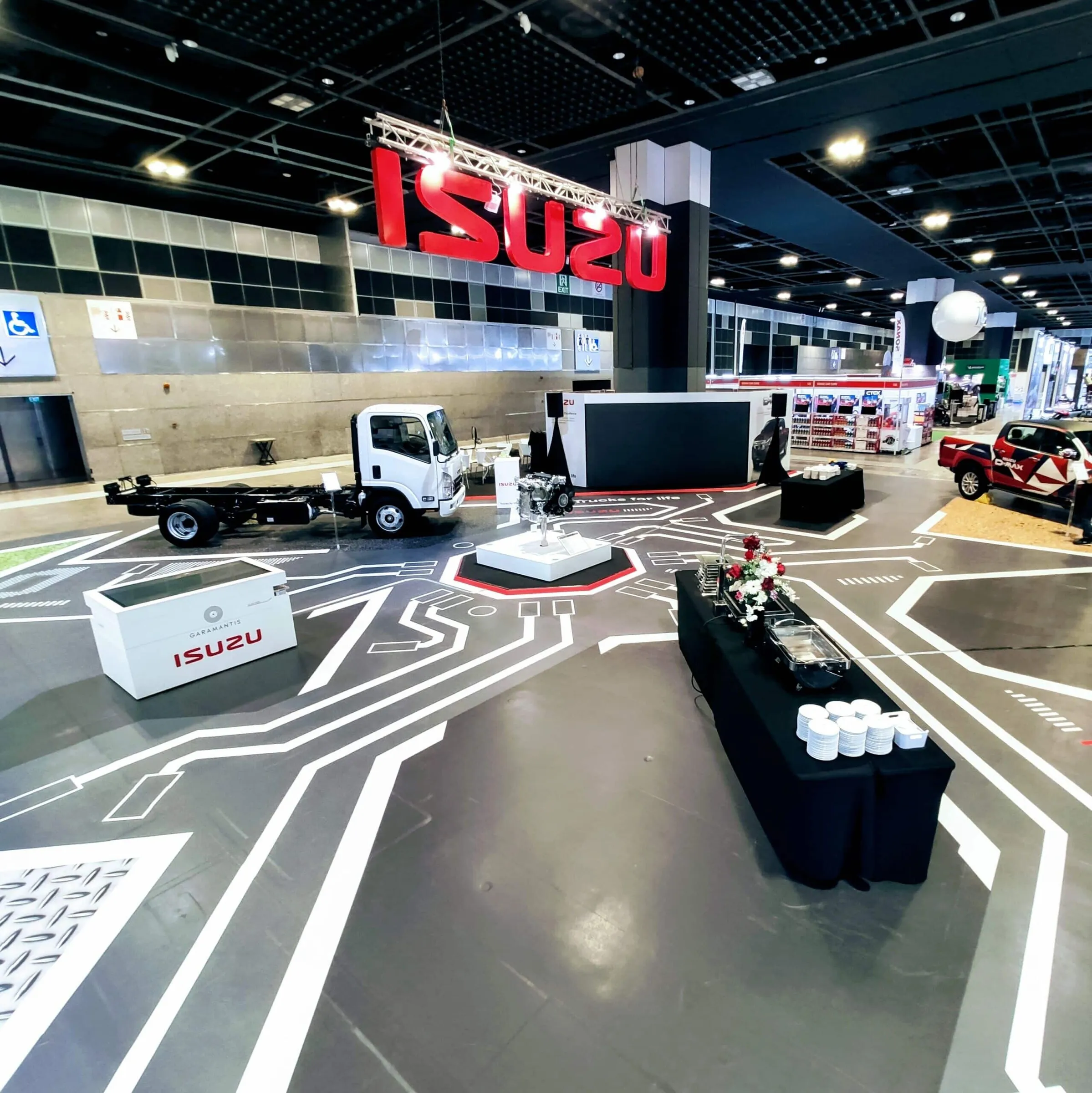 Interaktiver Messestand mit selbst gestalteten 3D-Trucks von Isuzu
