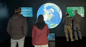 Interactive knowledge station with projected globe