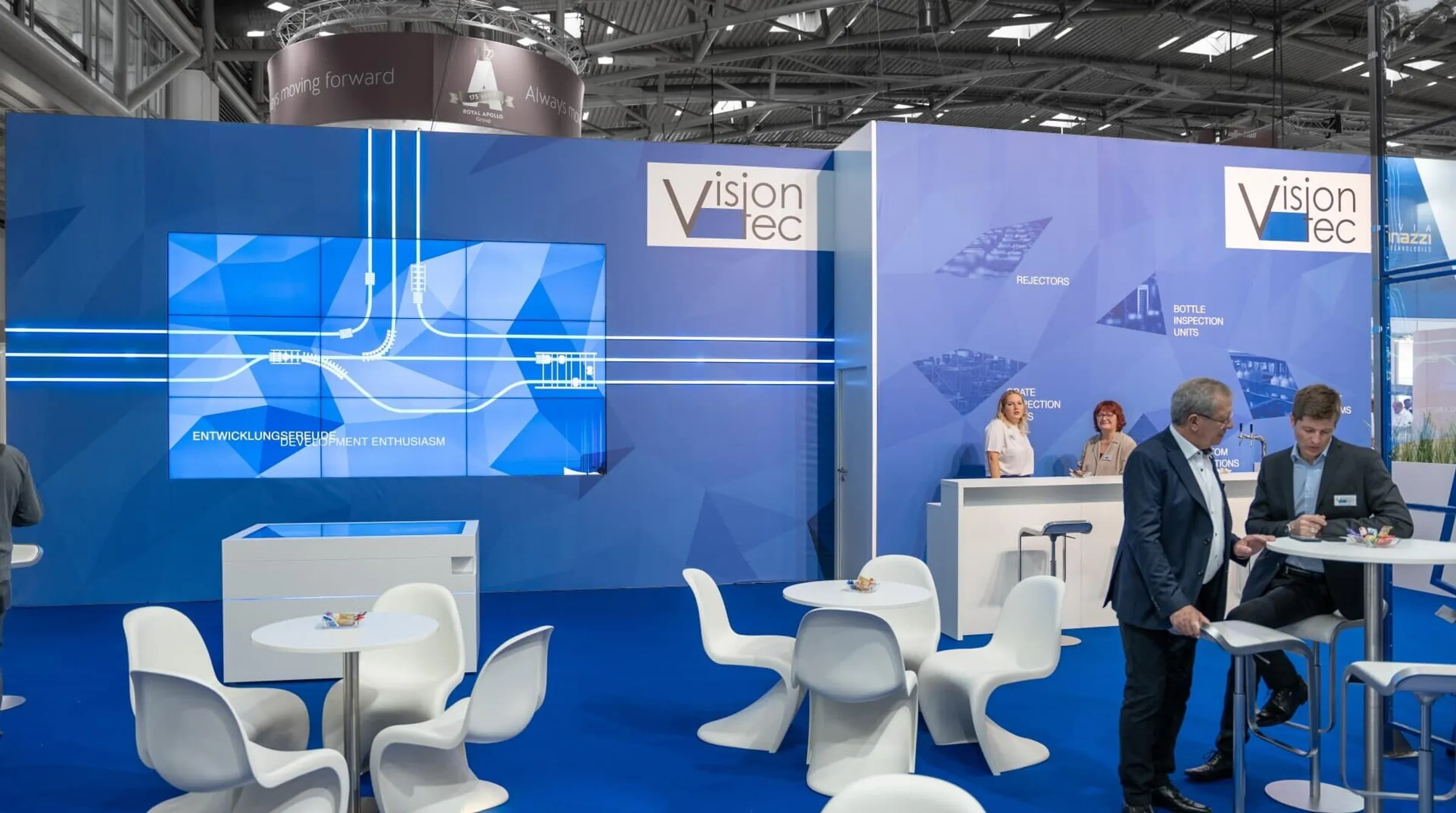 Interactive booth drinktec with screen wall and multitouch table