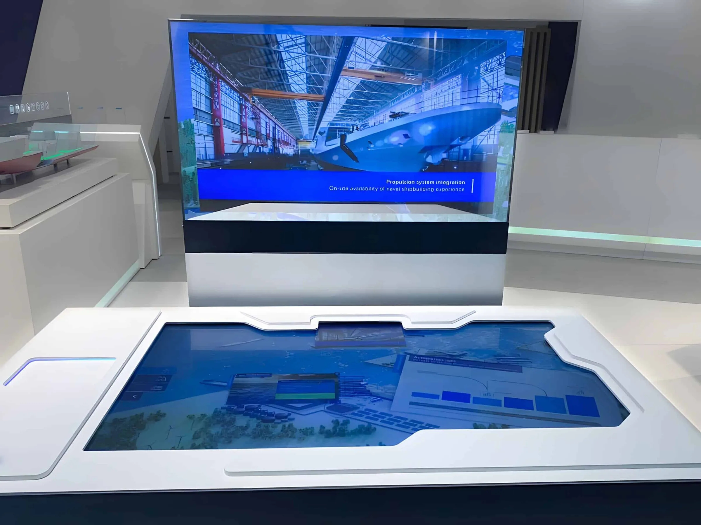 Touchtable with covered touchscreen and transparent screen
