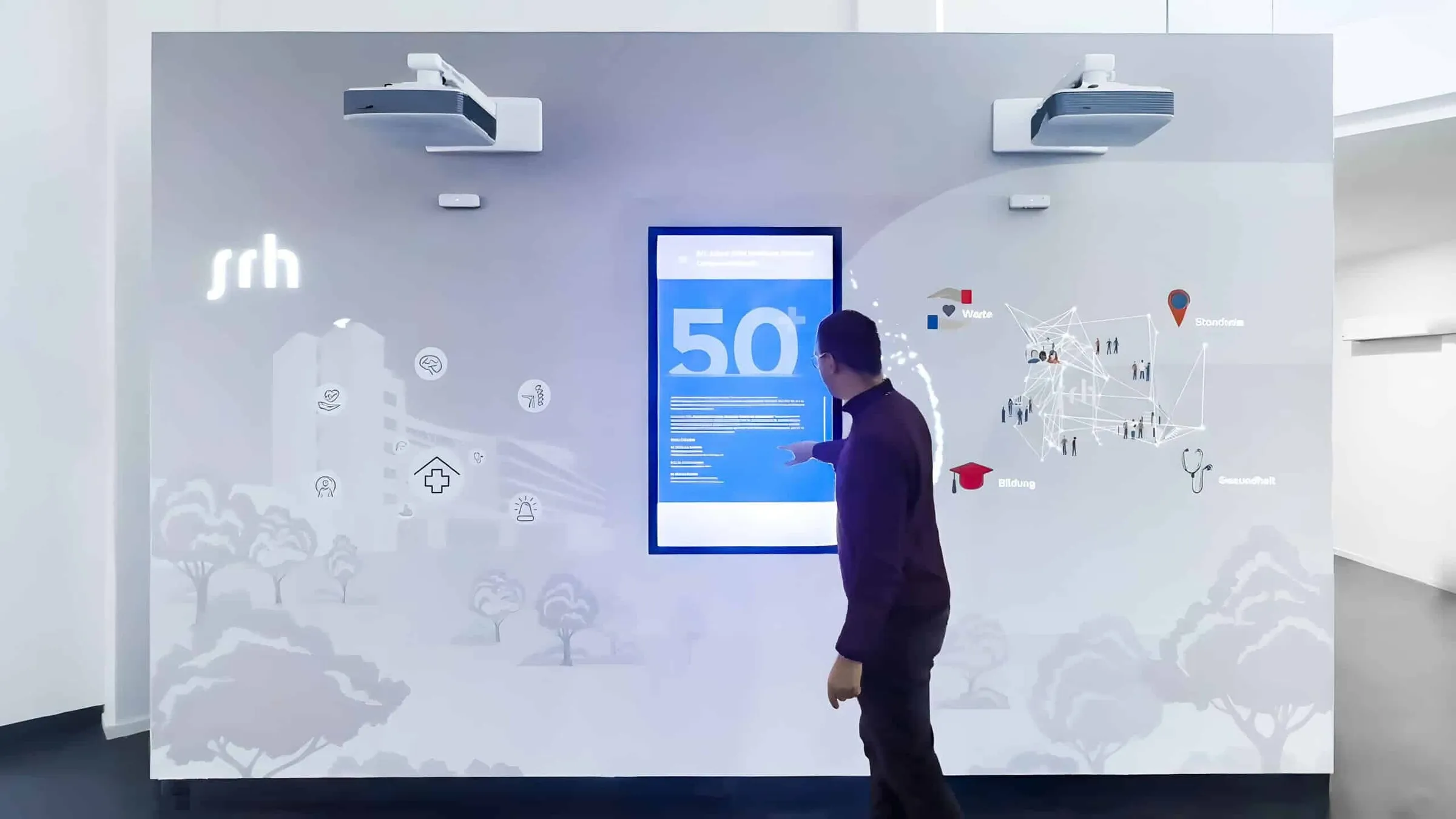 Interaktive Messewand mit Projection Mapping und Touchscreen