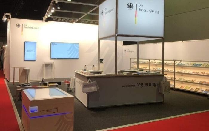 Trade fair stand of the German government at the Frankfurt Book Fair 2018 with multitouch scanner table from Garamantis