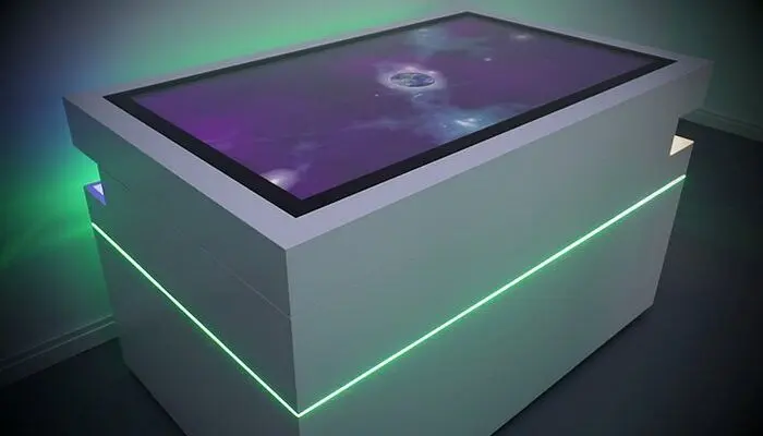 Multitouch table interactively illuminated with 660 LEDs