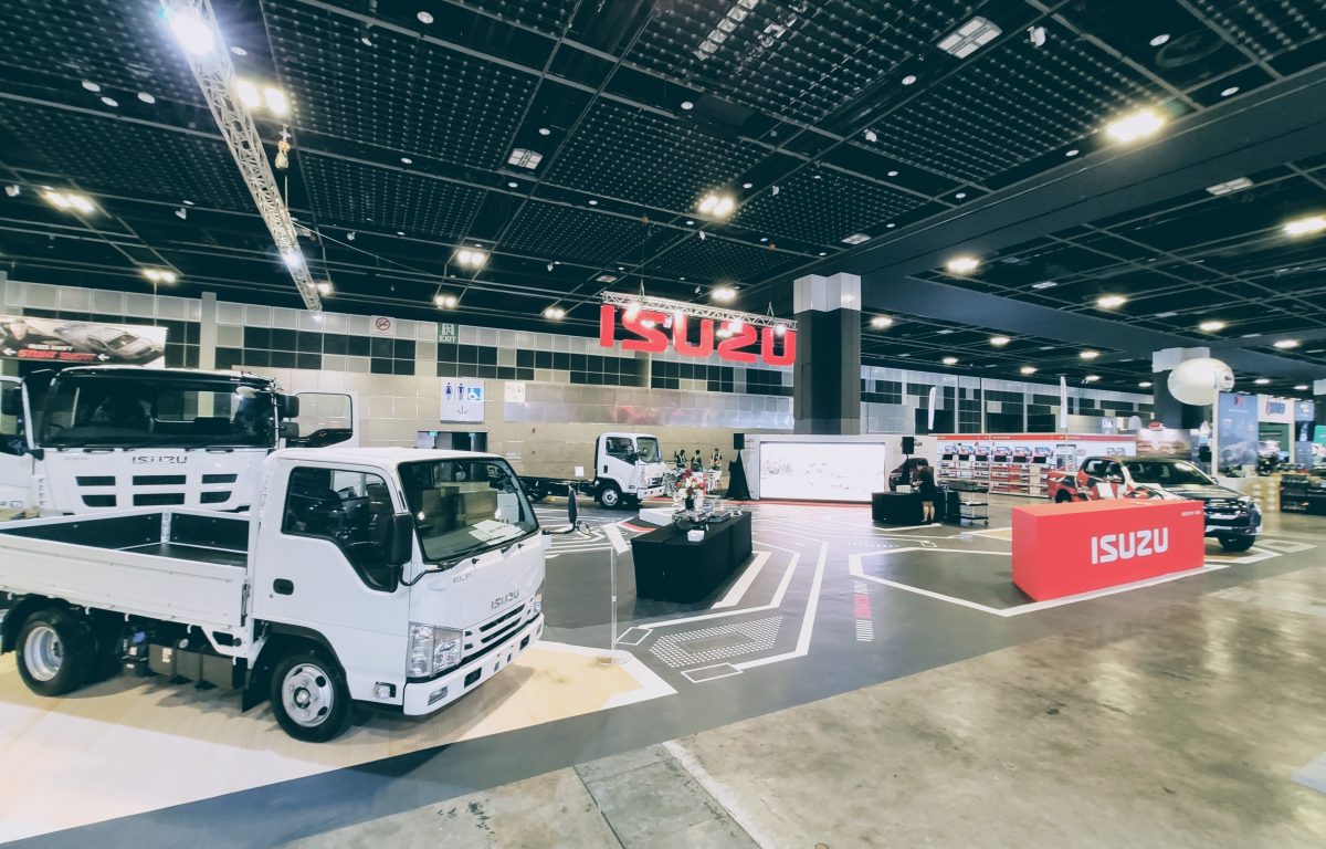Isuzu stand with exposed engine block in the middle of the pavilion