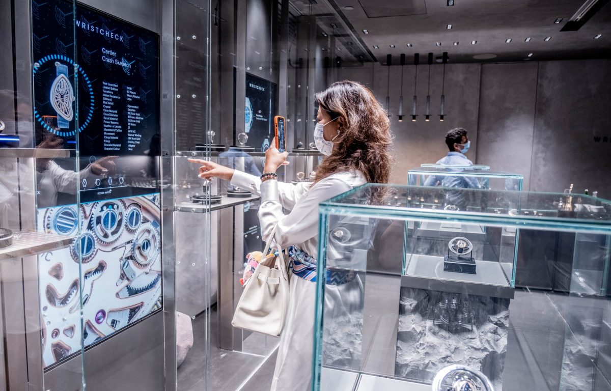 Responsive turntables and interactive screens react to the customer's hand gestures