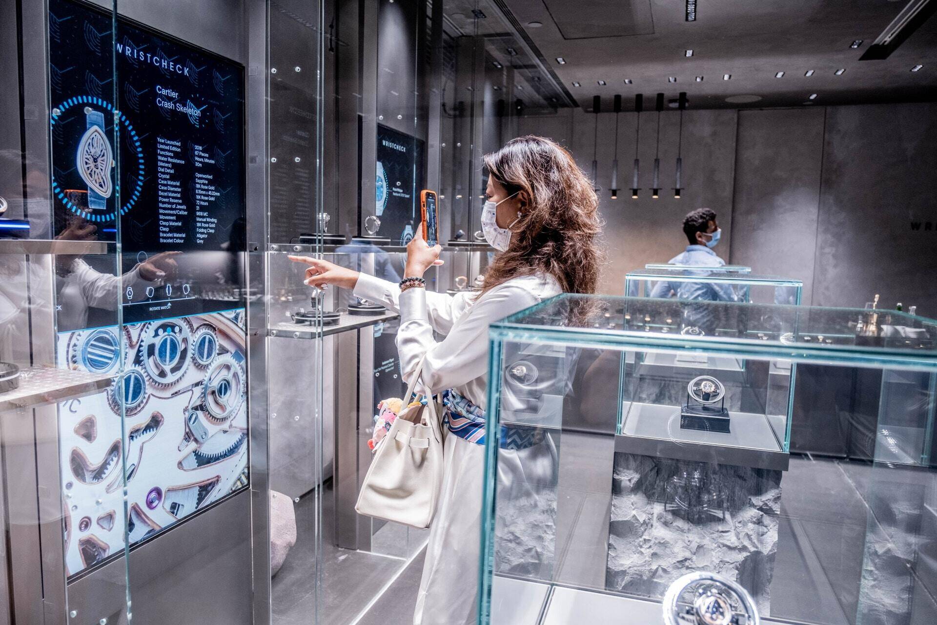 Responsive turntables and interactive screens react to the customer's hand gestures