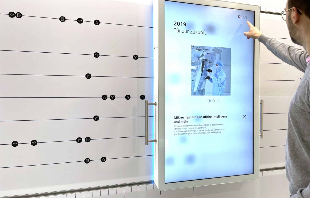 Sliding touchscreen interactively presents the history of innovation at Zeiss