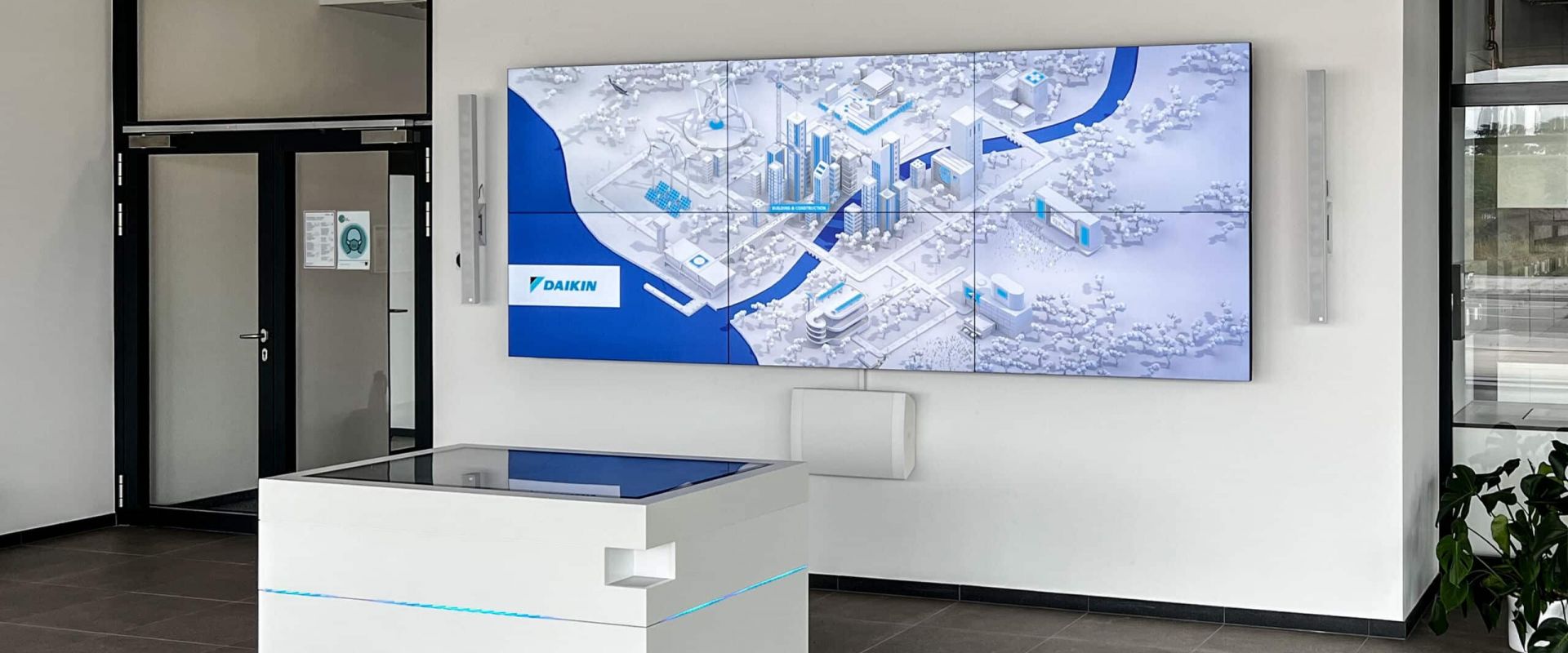 Daikin interactive showroom with multitouch table and screen wall
